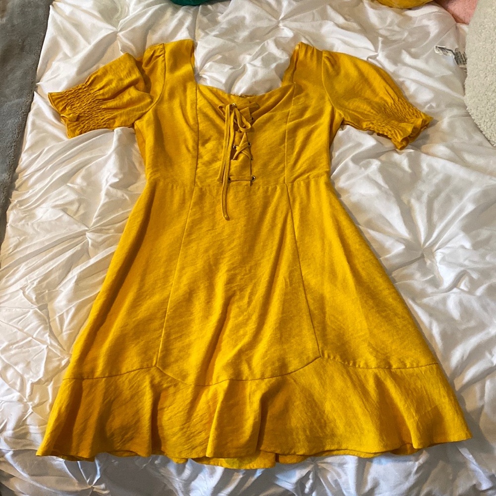 Mini gold lace-up dress from Lost+Wander.
